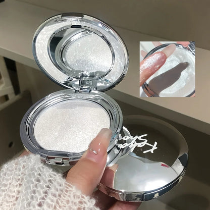 Blushimmer Monochrome Highlighter Cream with diamond sparkle, shimmery pearlescent texture, used for facial glow, contouring, and blush.