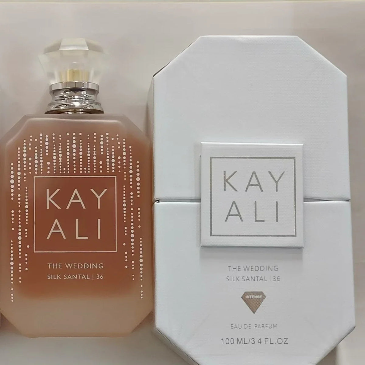 Blushimmer KAYALI 100ml women’s Eau De Parfum bottle with elegant floral scent featuring plum, jasmine, tuberose, vanilla, and suede