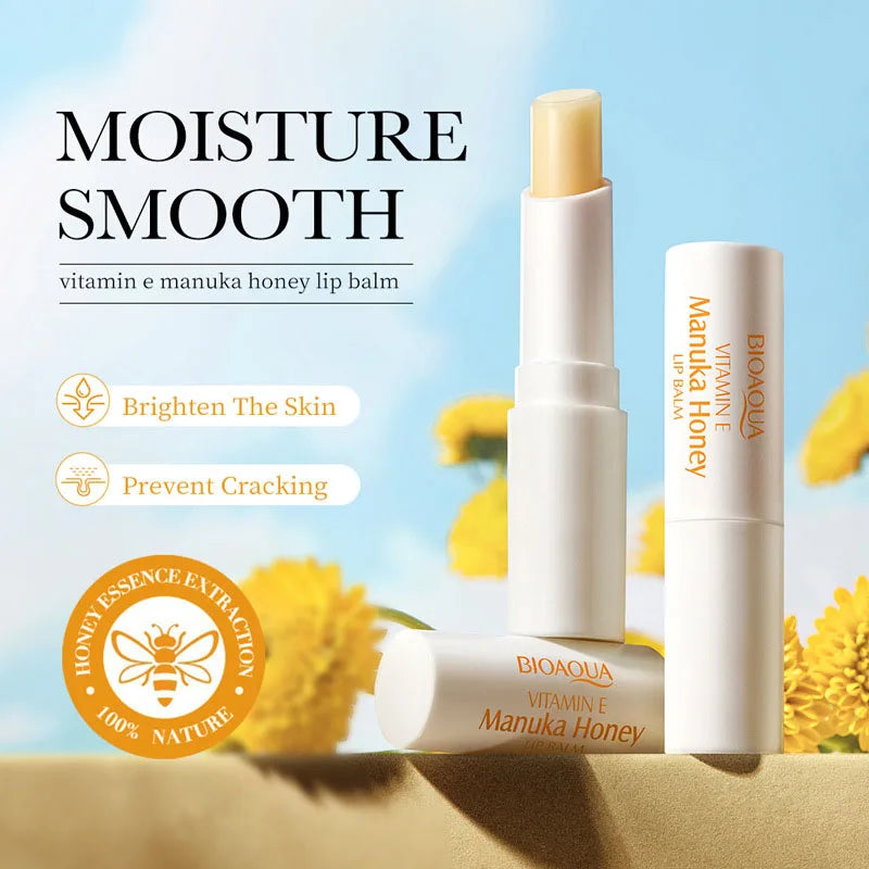 Blushimmer Vitamin E honey lip balm in a sleek tube, moisturizing, nourishing, and smoothing lips with a natural shine.