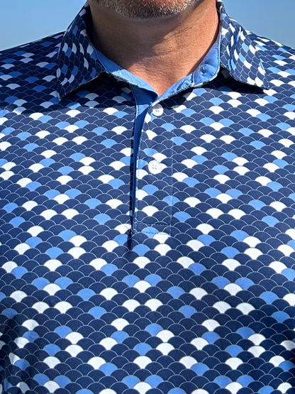 Close-up of a White Water Life Scales Polo shirt showing the fabric texture and detailed stitching.