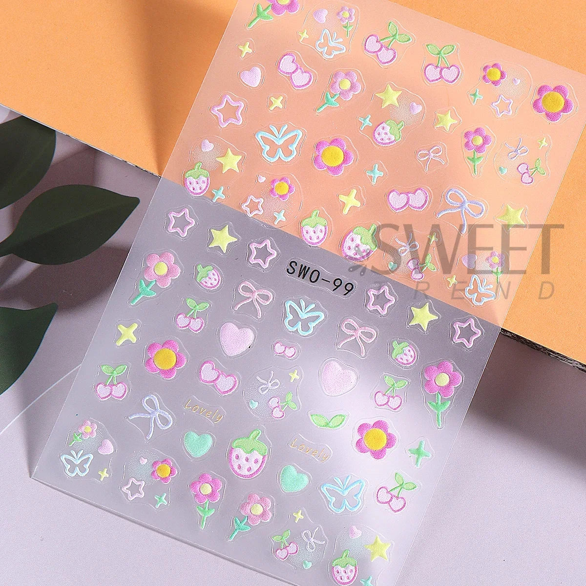 Colorful Blushimmer nail art stickers featuring flowers, hearts, cherries, strawberries, bows, butterflies, and kawaii designs for manicures.