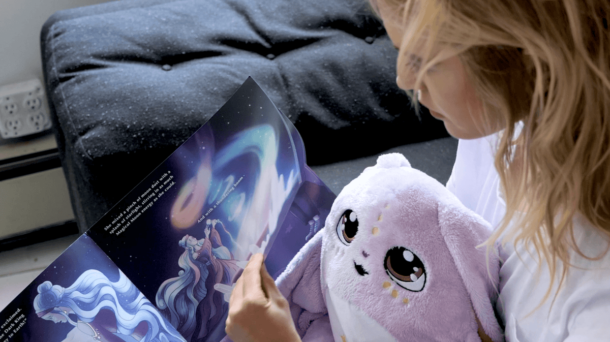Colorful Moon Pals storybook with illustrated pages showcasing whimsical characters and engaging story content.