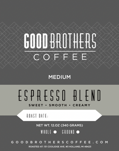 Roasted coffee beans from Good Brothers Coffee LLC's Espresso Blend, showcasing shiny, dark roasted beans in a close-up shot.