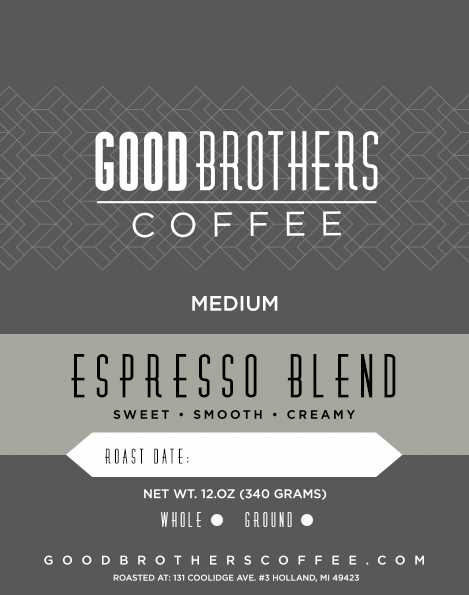 Roasted coffee beans from Good Brothers Coffee LLC's Espresso Blend, showcasing shiny, dark roasted beans in a close-up shot.