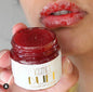 Kismet Buff All-Natural Lip Scrub in a clear jar with a spoon, showcasing exfoliating sugar and natural ingredients for smooth lips.