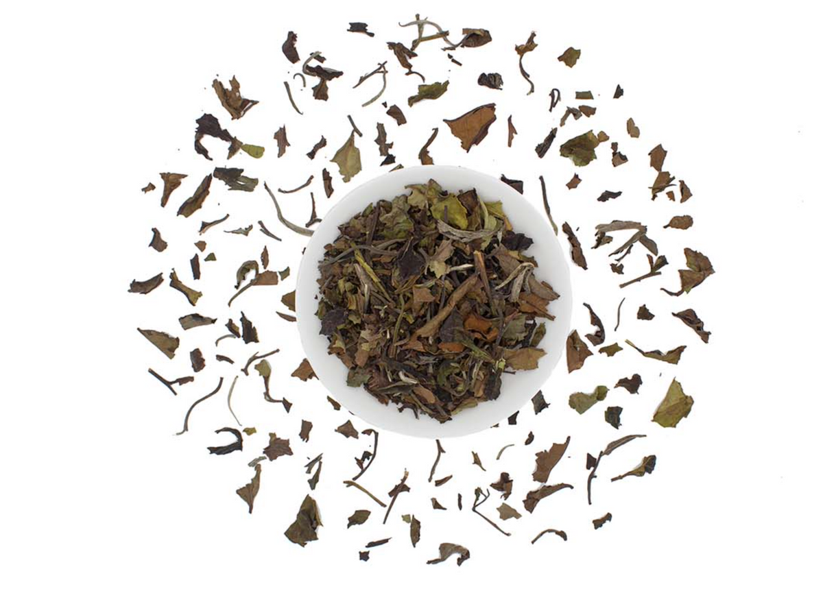 Organic white peony tea from Good Brothers Coffee LLC, loose leaf white tea with delicate white peony blossoms.