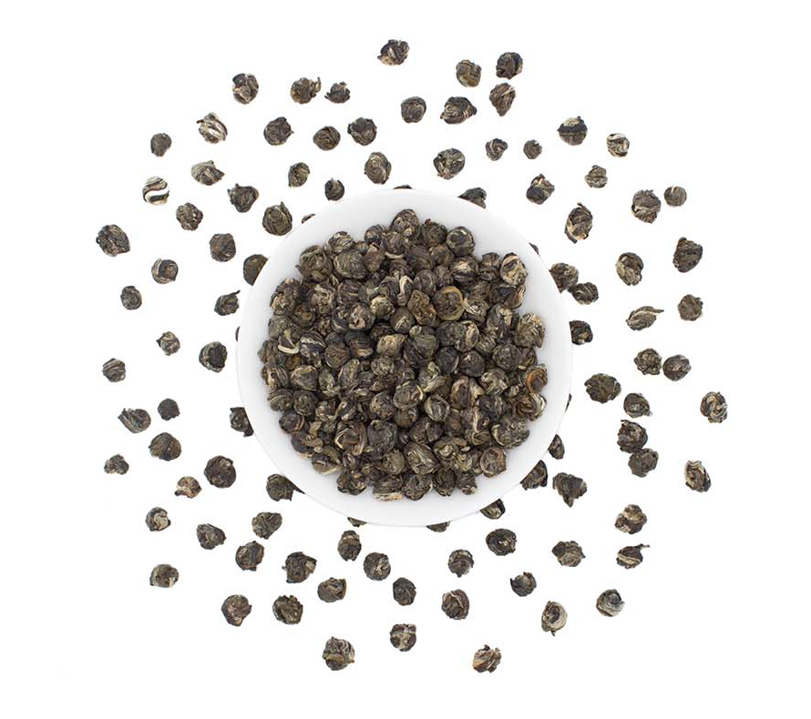 Loose leaf Jasmine Pearls green tea from Good Brothers Coffee LLC, showing fresh green tea pearls in a clear container.