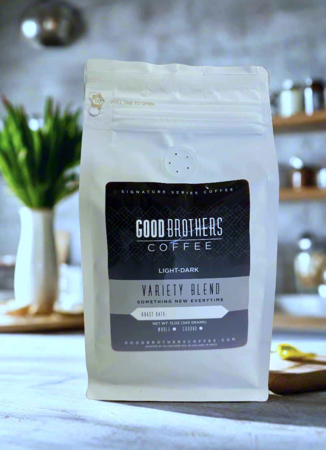 Screenshot of Good Brothers Coffee LLC.'s variety blend roasted coffee bag with colorful packaging.