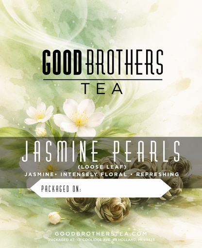 Loose leaf jasmine pearls green tea from Good Brothers Coffee LLC, showing green tea pearls and fresh jasmine blossoms.