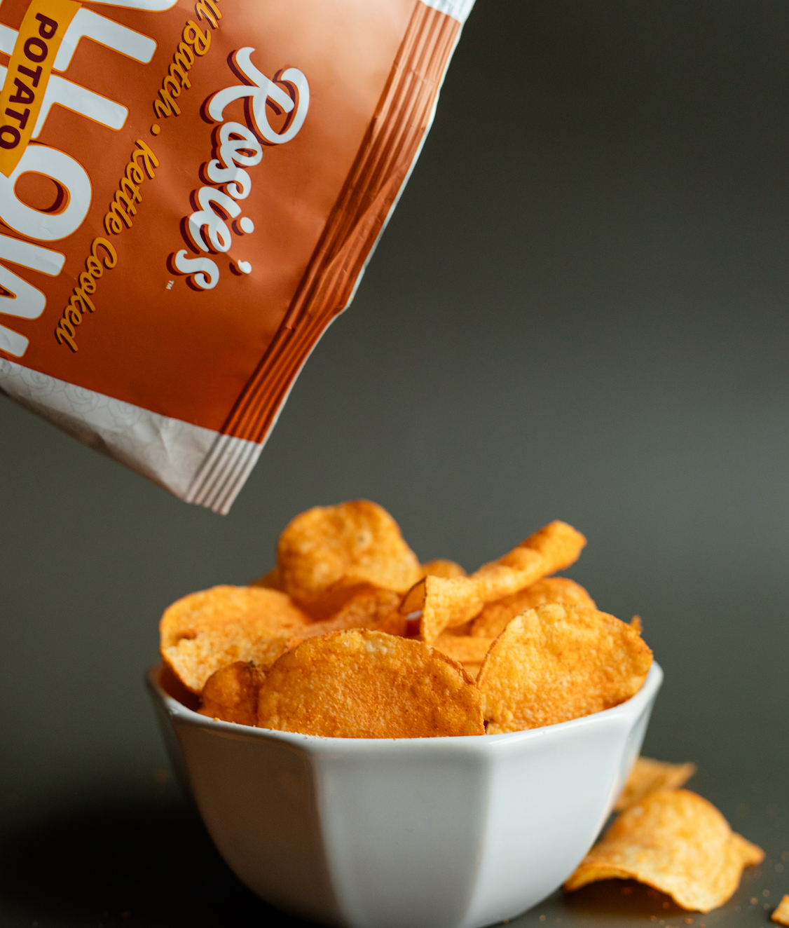 Image of Rosie's Chips potato chips in a bag, showcasing crispy, golden potato chips from the Rosie's Chips brand.
