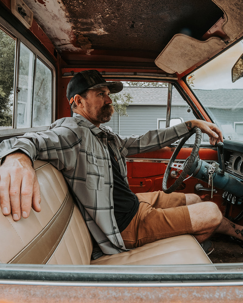 Long sleeve shirt in Steeple Grey with scrimshaw-style design by Off The Grid Surplus, featuring a casual fit and detailed embroidery.