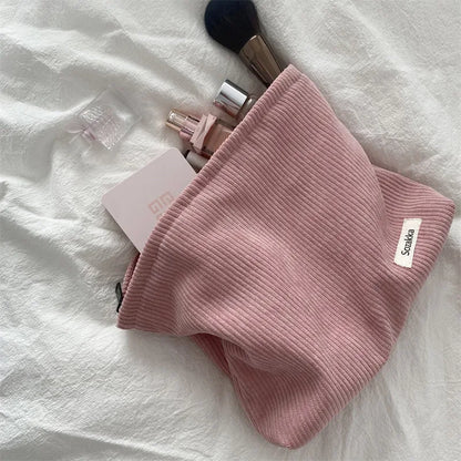 Blushimmer corduroy makeup bag with large capacity for lipstick, change, mobile phone, and essentials, handheld design.