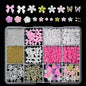 Set of 120 Blushimmer 3D gold bow and butterfly nail charms with shiny bowtie and star designs for nail art decorations.
