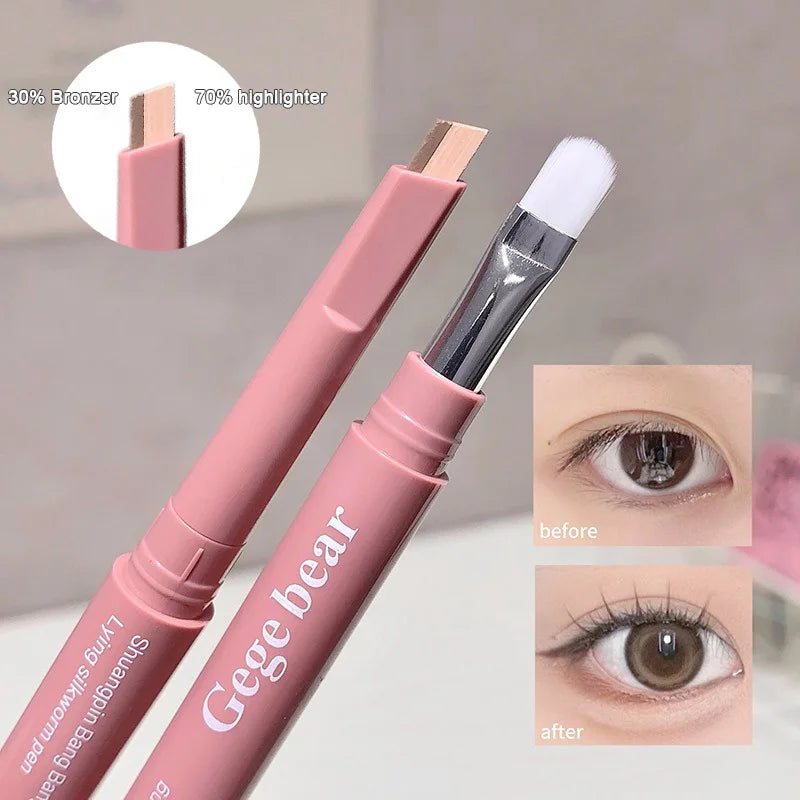 Blushimmer double-ended lying silkworm pencil with highlighter and eyeliner, nude shade, with detail brush for eye makeup application.