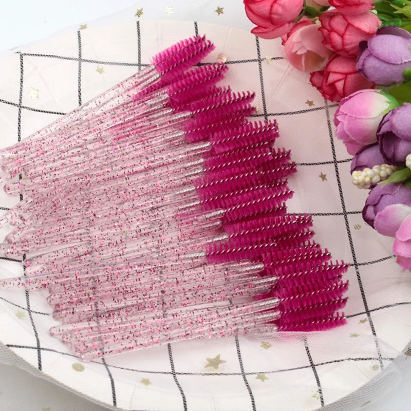 Set of 50 eyelash and eyebrow brushes from Blushimmer, including mascara wands and spoolers for false eyelash extensions.