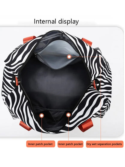 OBA women's zebra print carry-on travel duffel bag with handles for gym and travel use.