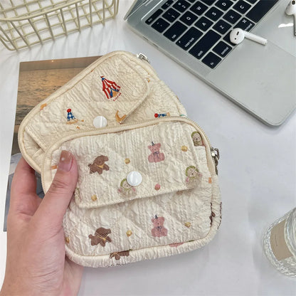Cute cartoon travel cosmetic and lipstick organizer pouch by Blushimmer, designed for storing earphones, cards, and small essentials.