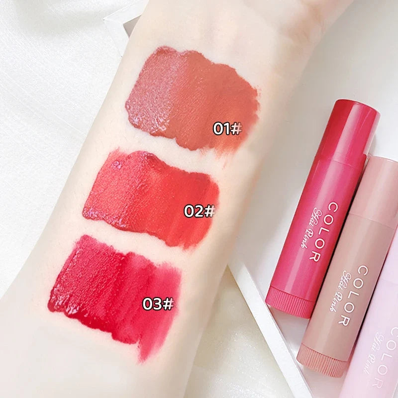 Blushimmer colored moisturizing lip balm with smooth texture, designed to hydrate lips and reduce lip lines.
