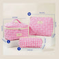 Cute quilted cotton makeup bag by Blushimmer with zipper, portable cloth organizer for cosmetics and toiletries, box shape design.