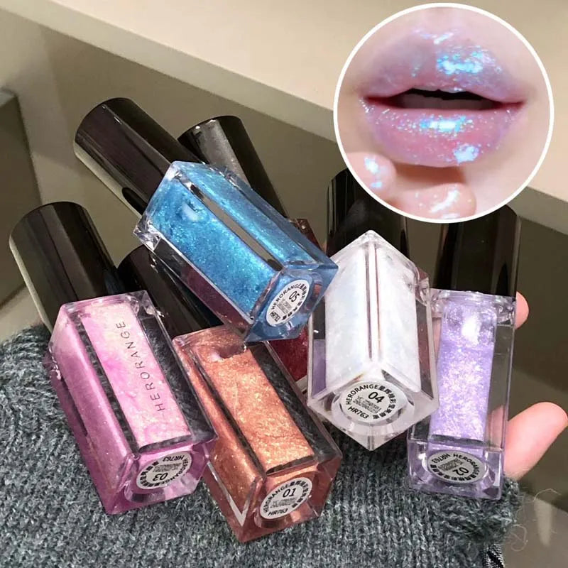 Blue mermaid color lip gloss by Blushimmer featuring pearlescent shine, diamond sparkle, and glitter finish for shiny, waterproof lips.
