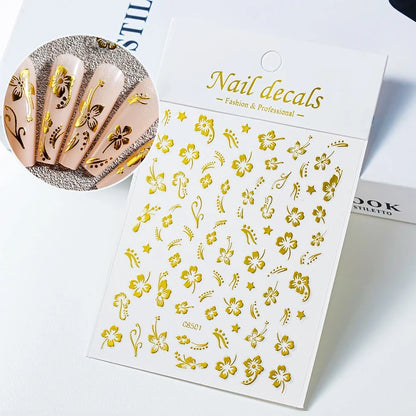 White and black 3D hibiscus flower nail sticker by Blushimmer with pink and gold floral petals for nail art decoration.