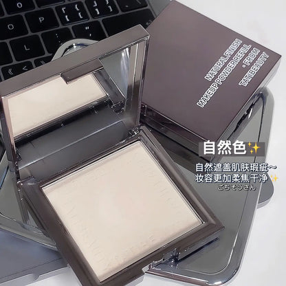 Small silver block powder by Blushimmer, soft focus loose setting powder for oil control, concealer, and pore lightening.