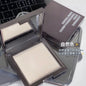 Small silver block powder by Blushimmer, soft focus loose setting powder for oil control, concealer, and pore lightening.