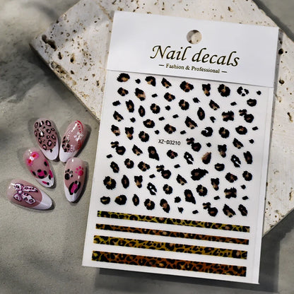 Pink and black 5D leopard print nail art stickers by Blushimmer on a transparent sheet, ready for DIY manicure decoration.