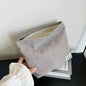 Large capacity Blushimmer corduroy makeup bag with lipstick, phone, and change compartments, handheld design for women.