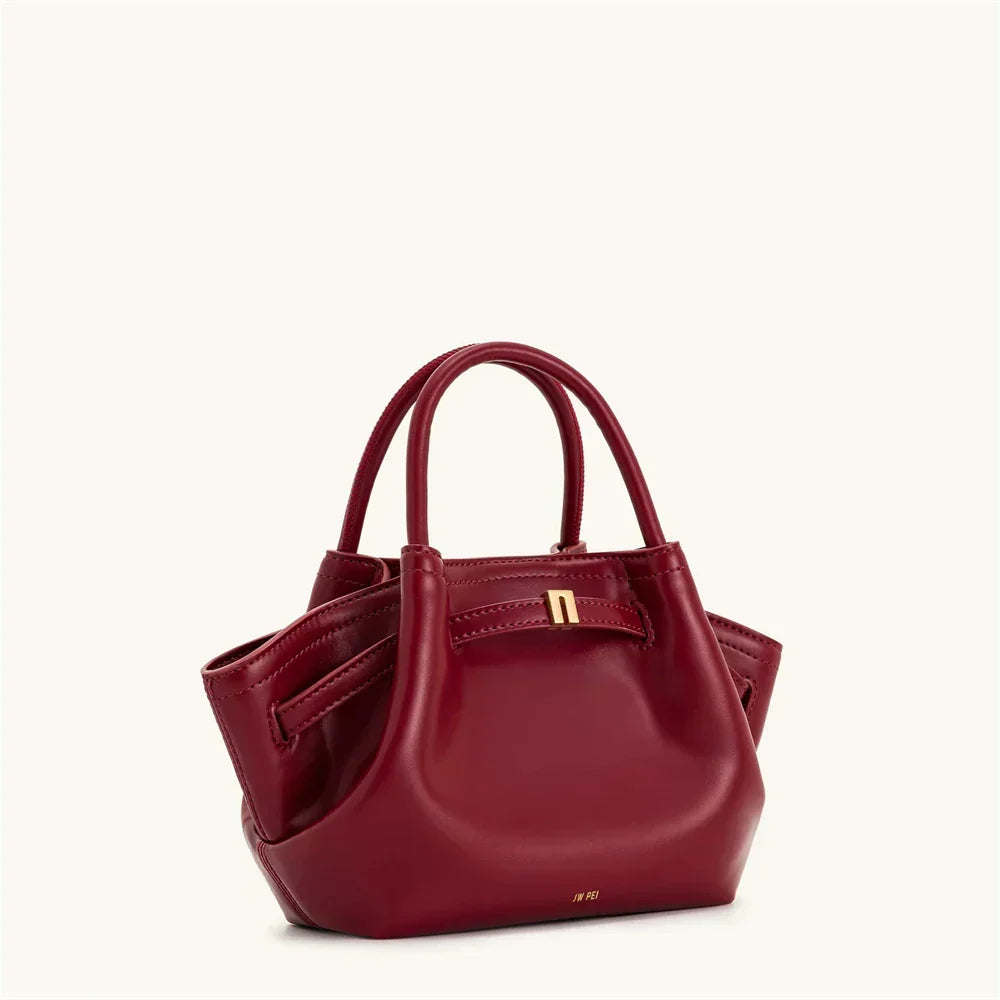 LPO women's brown canvas mini crossbody shoulder bag in wine red color with adjustable strap and compact design.