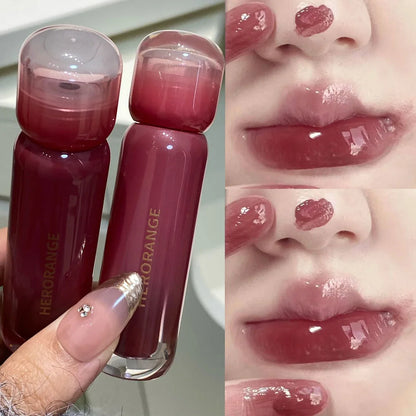 Blushimmer smoked grape purple red water lip gloss with mirror finish, moisturizing liquid lipstick in clear tint for Korean women makeup.