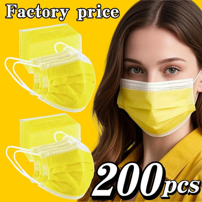 200-pack of yellow disposable protective masks with 3-layer breathable design, adjustable ear loops, and snug fit for comfortable wear