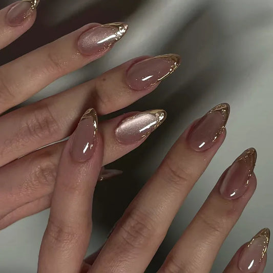 Set of 24 Blushimmer metallic cat eye French manicure tips with 3D textured acrylic false nails in nude pink almond shape.