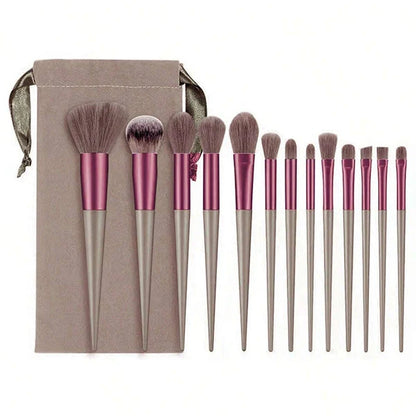 Set of 13 Blushimmer makeup brushes including eyeshadow, foundation, blush, and cosmetic tools in a soft makeup bag.
