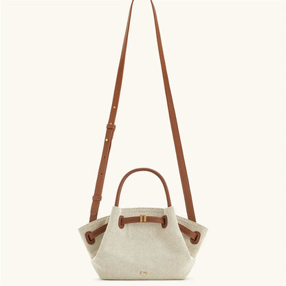 OBA women's brown canvas mini crossbody shoulder bag with adjustable strap and compact design, ideal for casual outings.