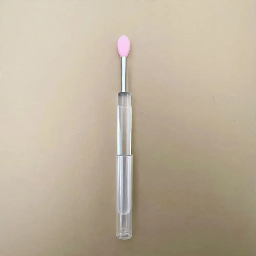 Blushimmer portable gold and silver lips makeup brush pen with metal handle, protective cap for lip gloss and lipstick application.