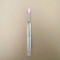 Blushimmer portable gold and silver lips makeup brush pen with metal handle, protective cap for lip gloss and lipstick application.