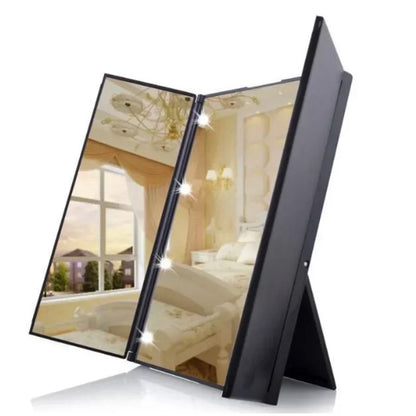 Blushimmer portable three-sided LED makeup mirror with adjustable lighting, ideal for travel and quick touch-ups.