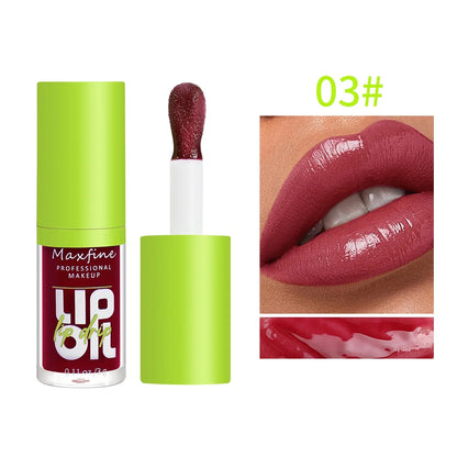 Blushimmer 6-tone moisturizing luminous lip gloss oil in 3g transparent liquid, showing the glossy, shiny applicator and clear product.