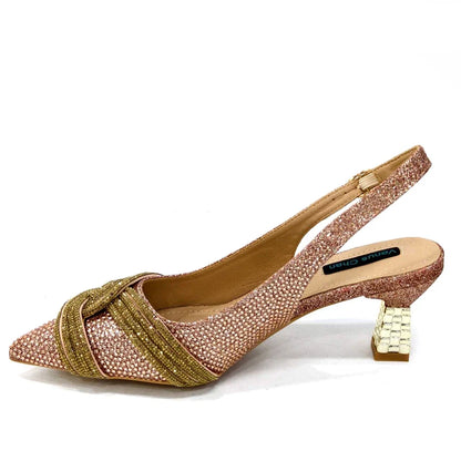 Elegant women's shoes and matching handbag set with rhinestones by EdleessFashion, showcasing luxurious design and sparkling details.