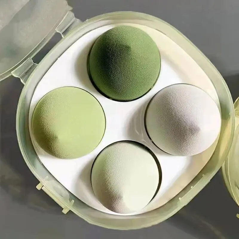 Set of four Blushimmer beauty egg makeup sponges with egg box for foundation, cream, and powder application on face.