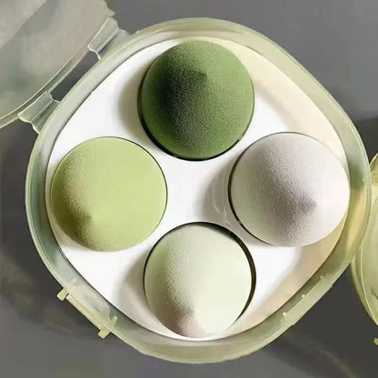Set of four Blushimmer beauty egg makeup sponges with egg box for foundation, cream, and powder application on face.