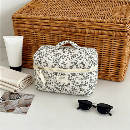 Large capacity Blushimmer makeup pouch with multiple compartments, ideal for cosmetics and travel organization.