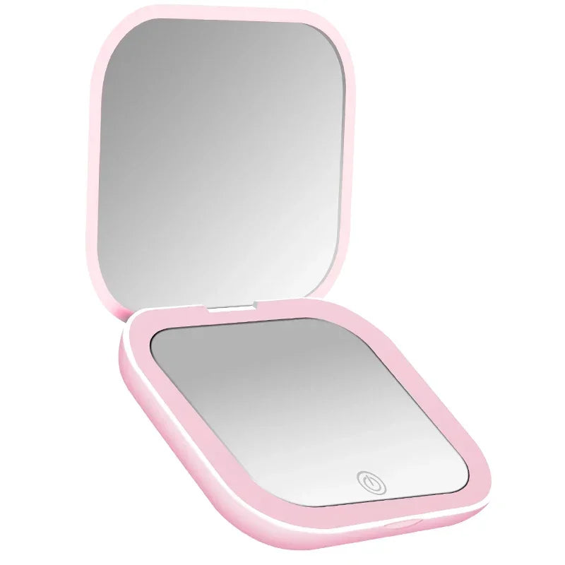 Blushimmer 2X magnifying compact vanity makeup mirror with LED lights, portable folding design, ideal for travel and grooming.