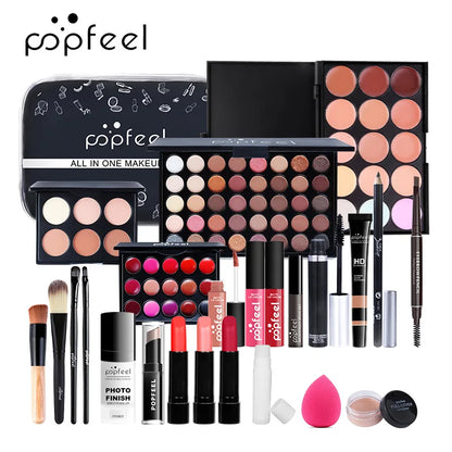 Blushimmer all-in-one makeup kit featuring eyeshadow palette, foundation, lip gloss, blush, brushes, and eyeliner in mixed colors.
