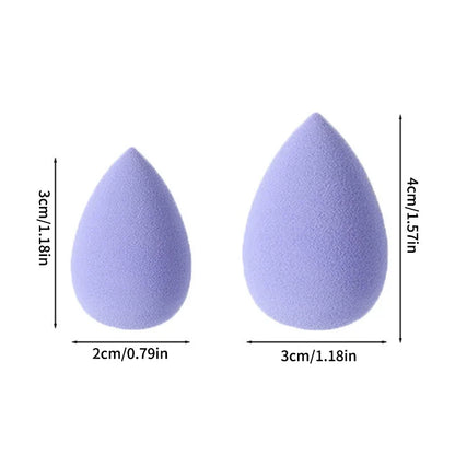Set of 12 Blushimmer powder puffs featuring soft velour triangles for applying loose and setting powder smoothly.