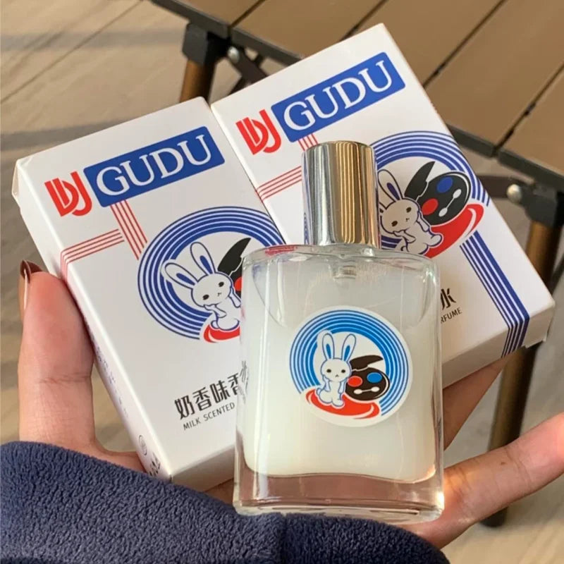 Blushimmer perfume spray bottle featuring Oud Wood, Sandalwood, and floral notes for men, designed to attract women and enhance romance.