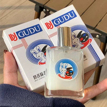 Blushimmer perfume spray bottle featuring Oud Wood, Sandalwood, and floral notes for men, designed to attract women and enhance romance.
