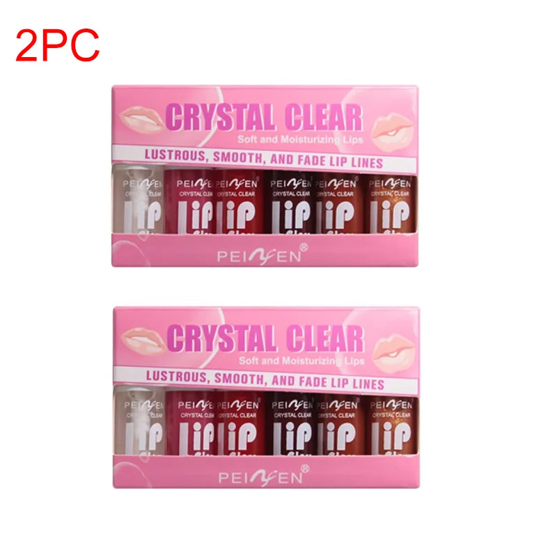 Six clear moisturizing lip gloss bottles with hydrating lip oil and plumper effect, branded Blushimmer, on a neutral background.