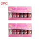 Six clear moisturizing lip gloss bottles with hydrating lip oil and plumper effect, branded Blushimmer, on a neutral background.